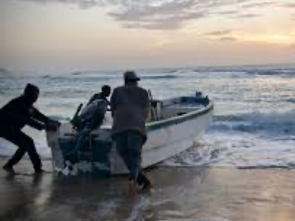 Somali fishermen boat sunrise